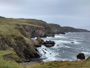 Cliffs and white waves