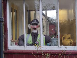 PC Pexker - a sculpture in a Falkland House porch
